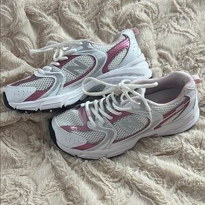 Women's White and Pink New Balance 530 athletic Shoes.